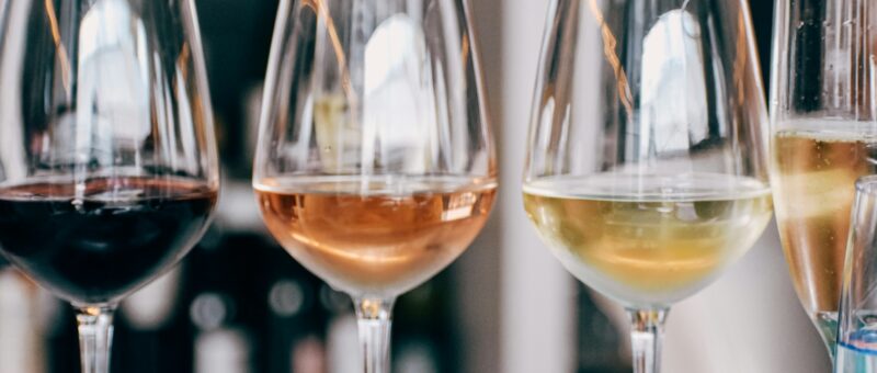 four wine glasses in a row